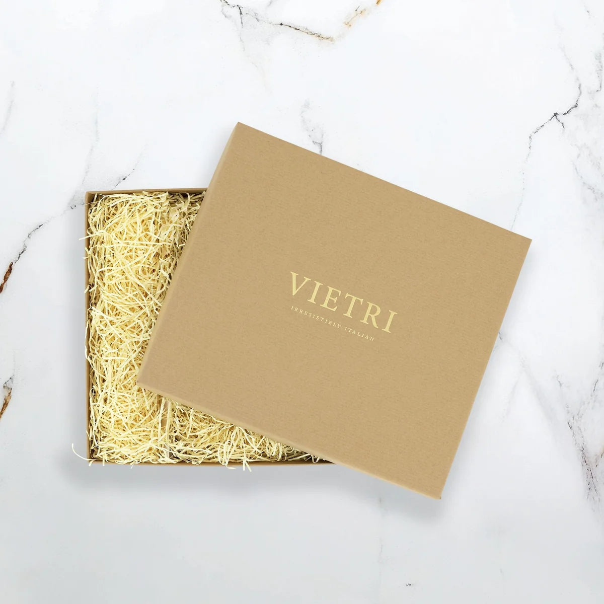 Brown gift box with 'VIETRI' branding on a marble surface