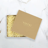 Brown gift box with 'VIETRI' branding on a marble surface
