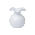 White glass vase with a wavy top on a white background