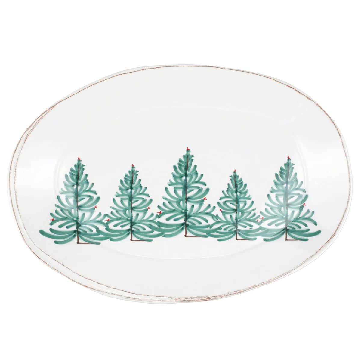 Round ceramic plate with green Christmas tree design on a white background