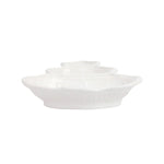 Set of three white ceramic bowls stacked on a white background