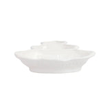 Set of three white ceramic bowls stacked on a white background