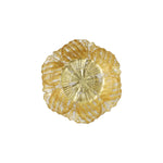 A single round decorative dish with a scalloped, flower-like rim and a ribbed center, shown from above on a plain white background.
